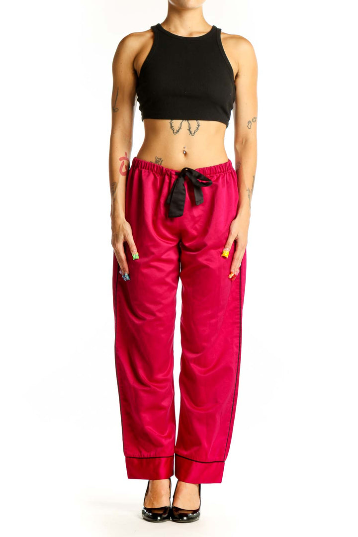 Front view of red Oscar de la Renta PINK LABEL lounge pants with black drawstring