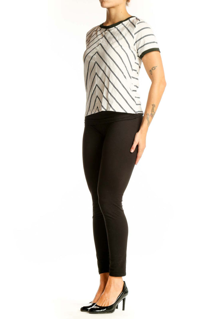 Front view of J.Crew white cotton top with green chevron stripes