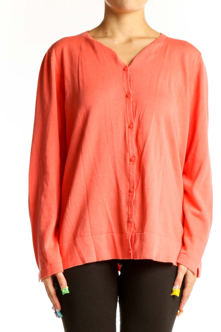 Front view of coral button-up cotton cardigan from El Corte Ingles