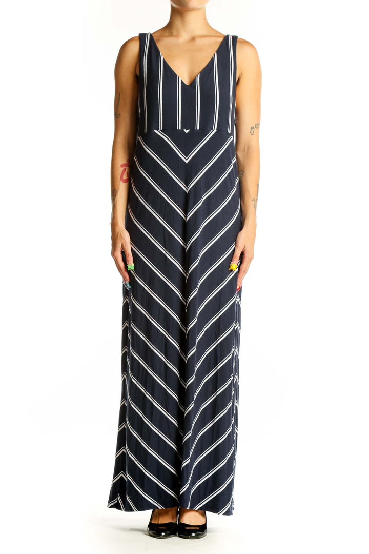 Front view of Athleta navy striped maxi dress with V-neck and chevron pattern