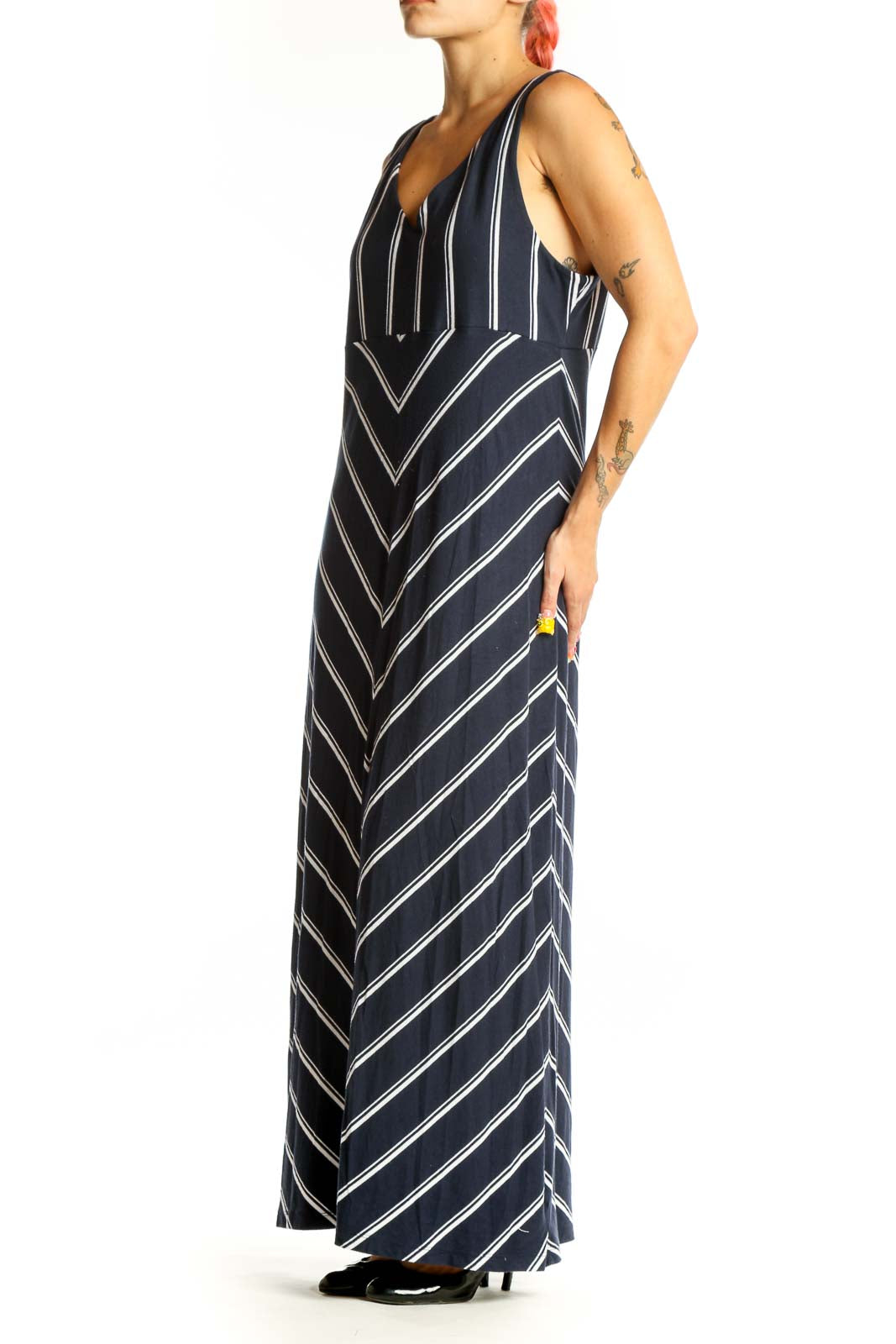 Front view of Athleta navy striped maxi dress with V-neck and chevron pattern