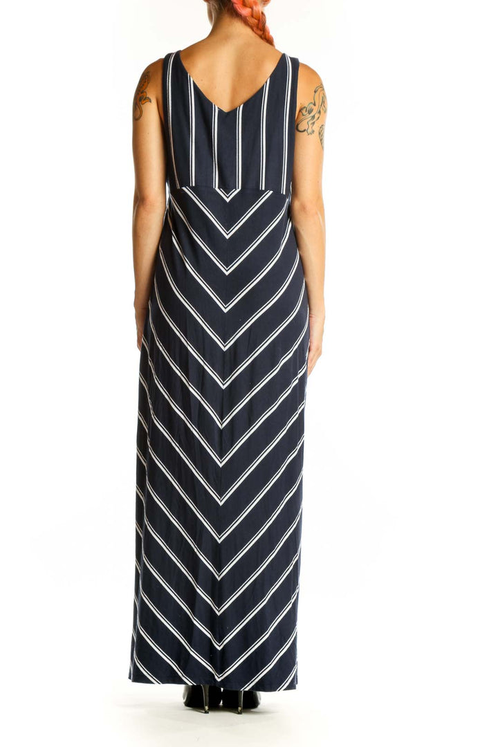 Side view of Athleta navy striped maxi dress showing full length and silhouette