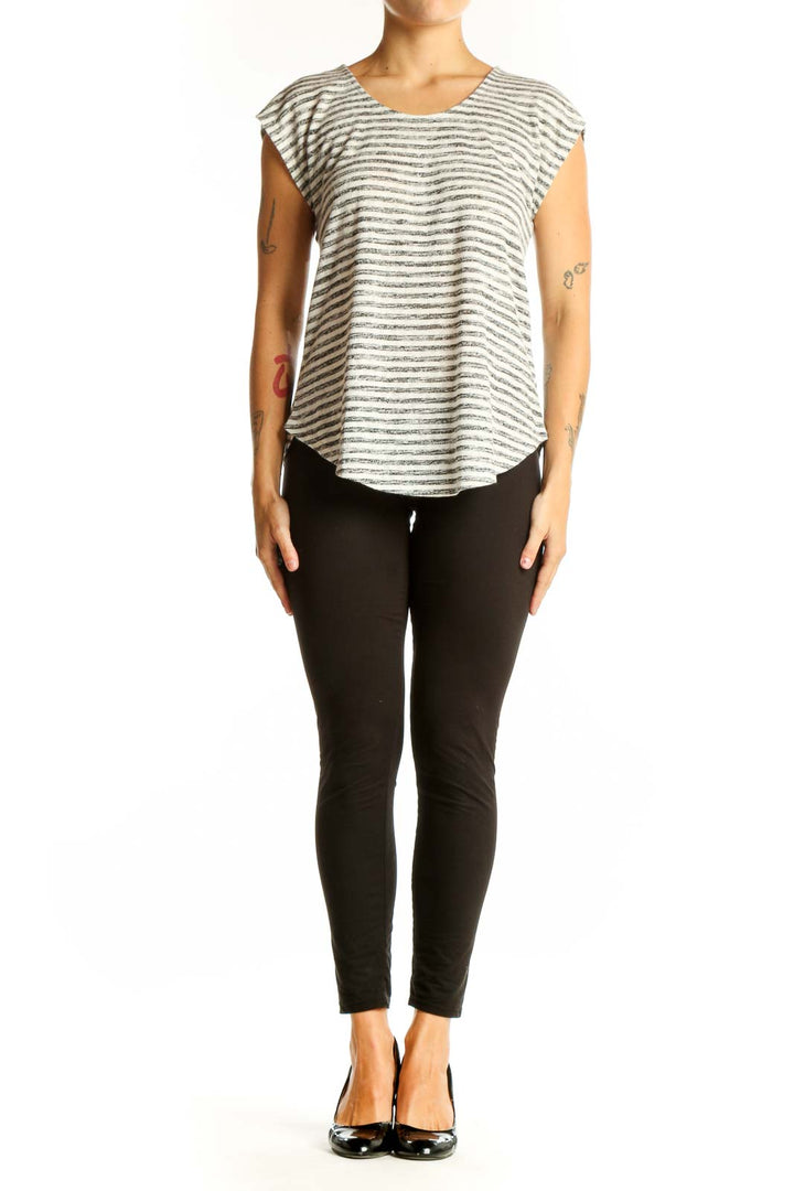 Front view of Bobeau Gray Striped Cap Sleeve Top on model