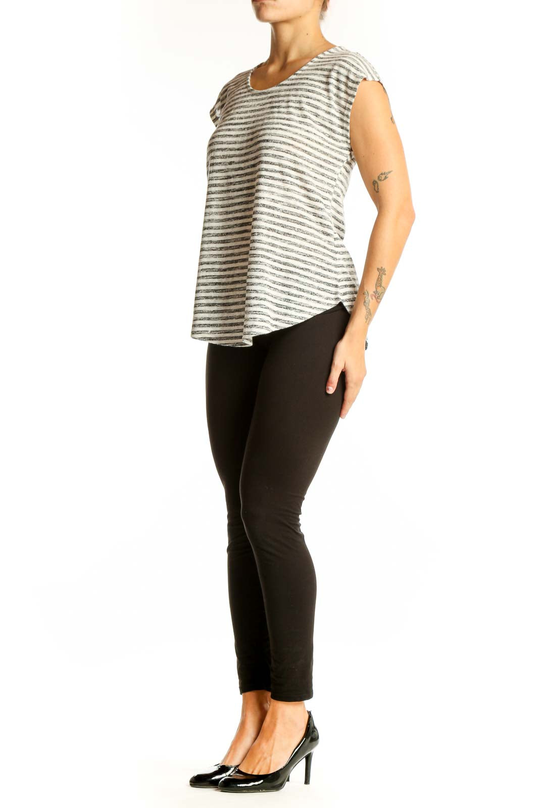 Front view of Bobeau Gray Striped Cap Sleeve Top on model