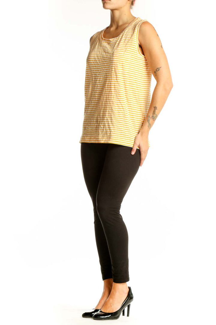 Front view of Madewell yellow and white striped sleeveless cotton top with chest pocket