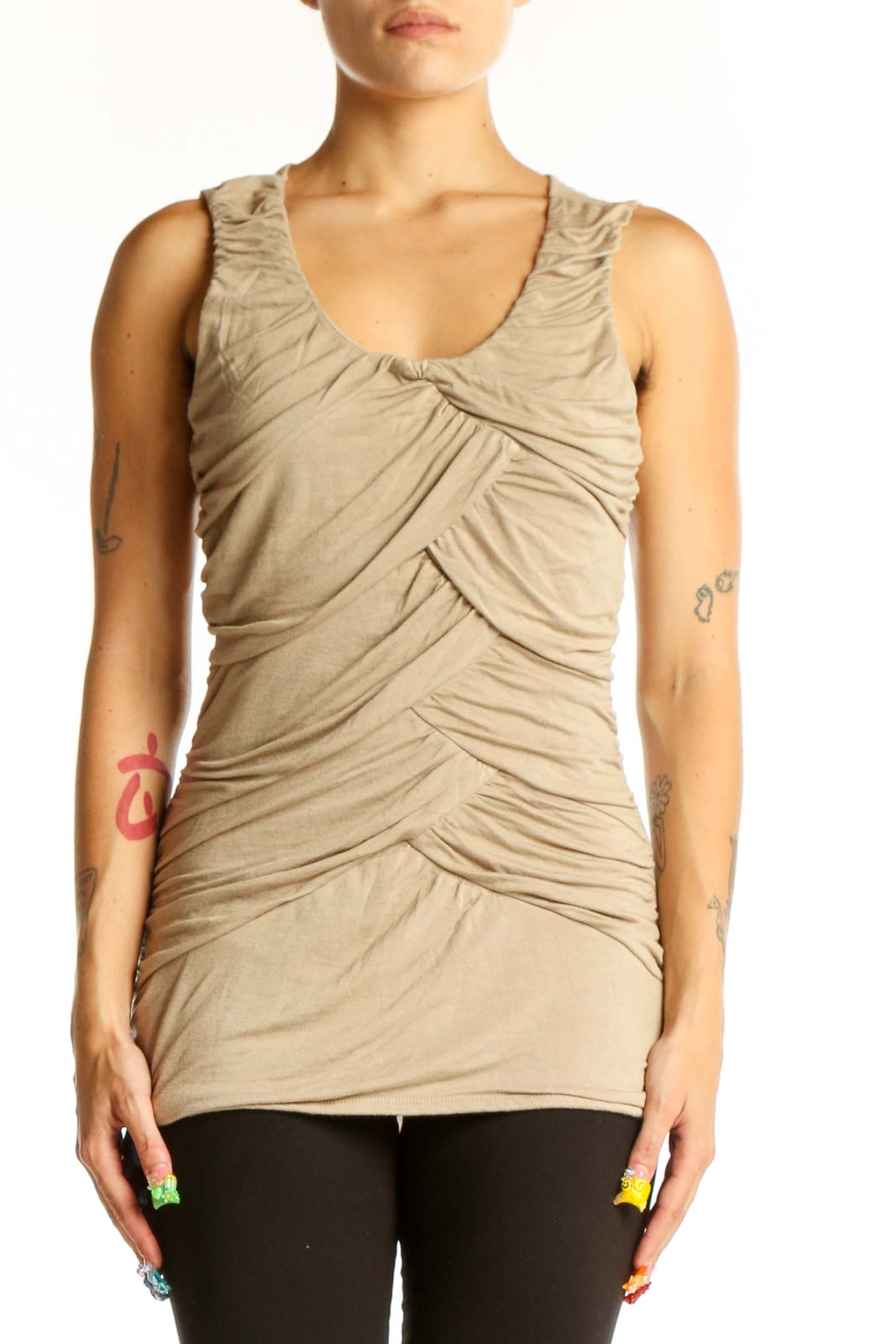 Front view of beige ruched sleeveless top from Maurices