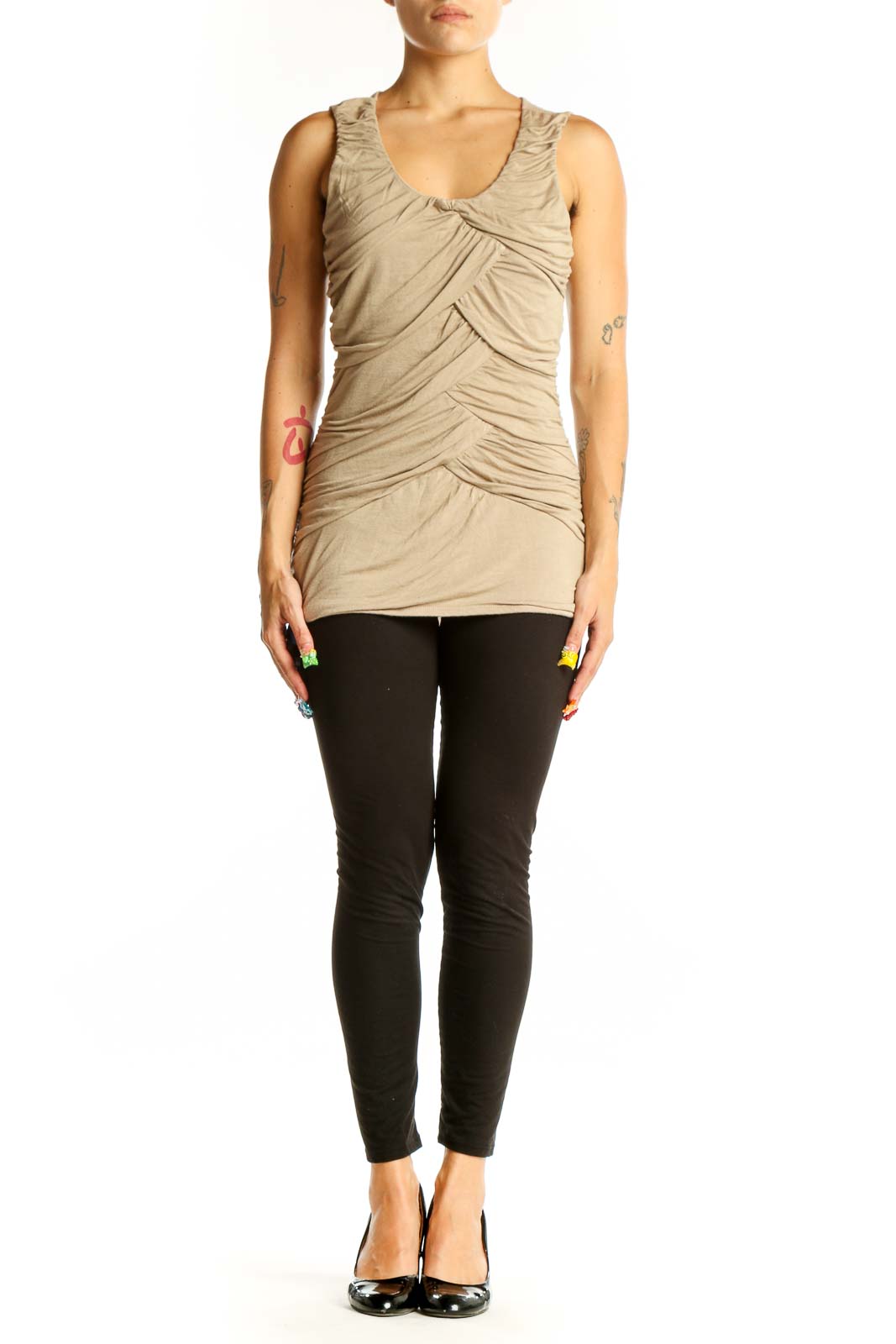 Front view of beige ruched sleeveless top from Maurices
