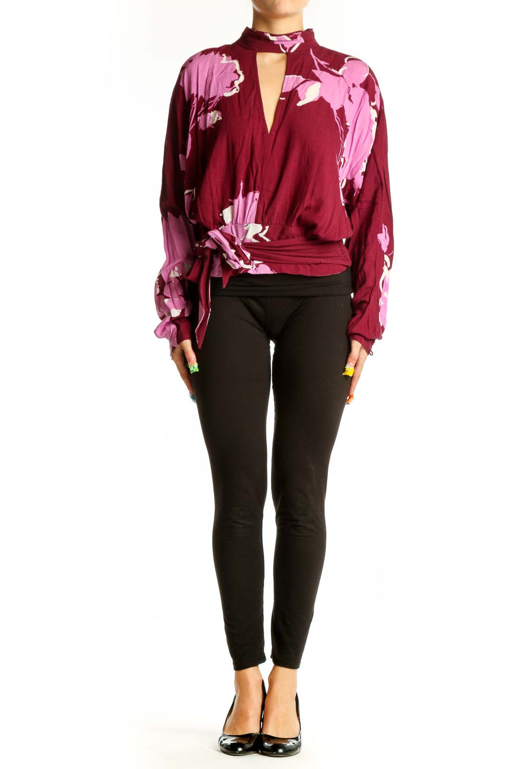Front view of burgundy floral print wrap top with V-neckline and choker collar