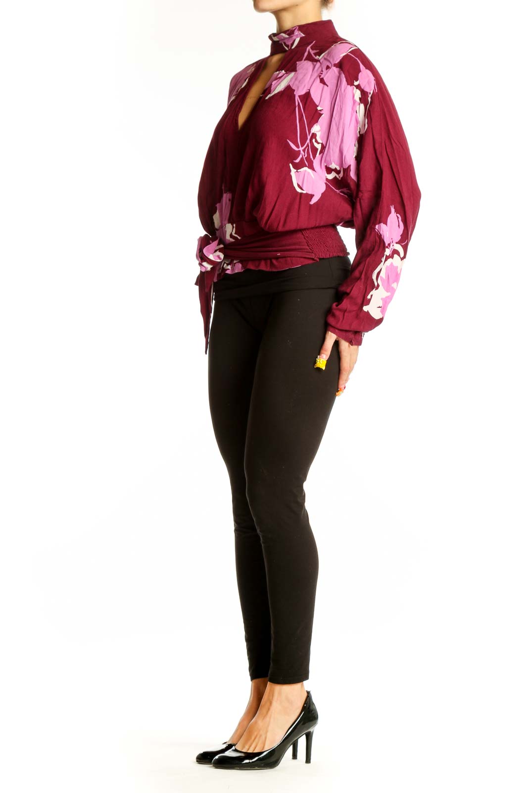 Front view of burgundy floral print wrap top with V-neckline and choker collar