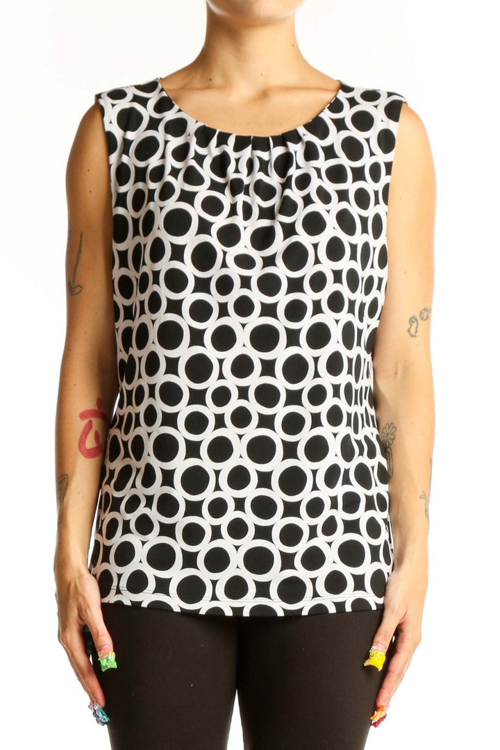 Front view of Calvin Klein Black and White Polka Dot Sleeveless Top