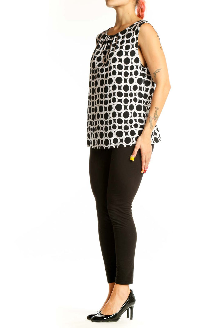 Front view of Calvin Klein Black and White Polka Dot Sleeveless Top