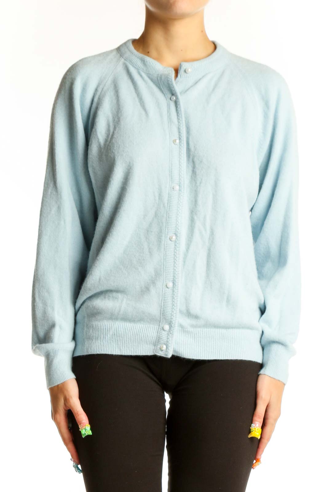 Front view of light blue acrylic button-up cardigan by Designers Originals