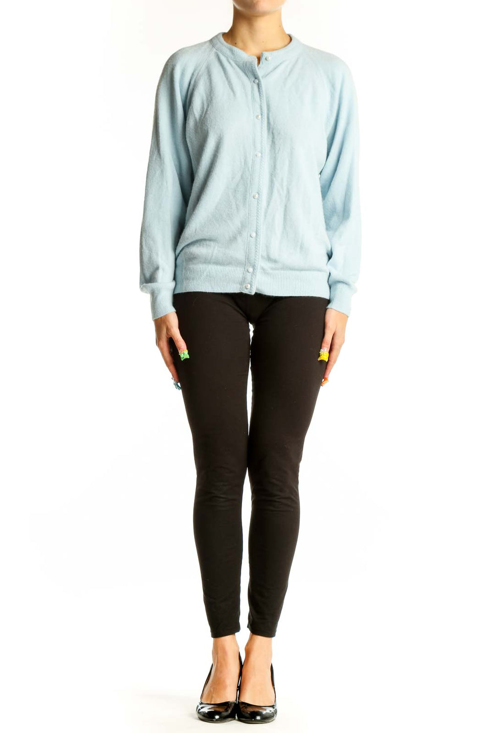 Front view of light blue acrylic button-up cardigan by Designers Originals