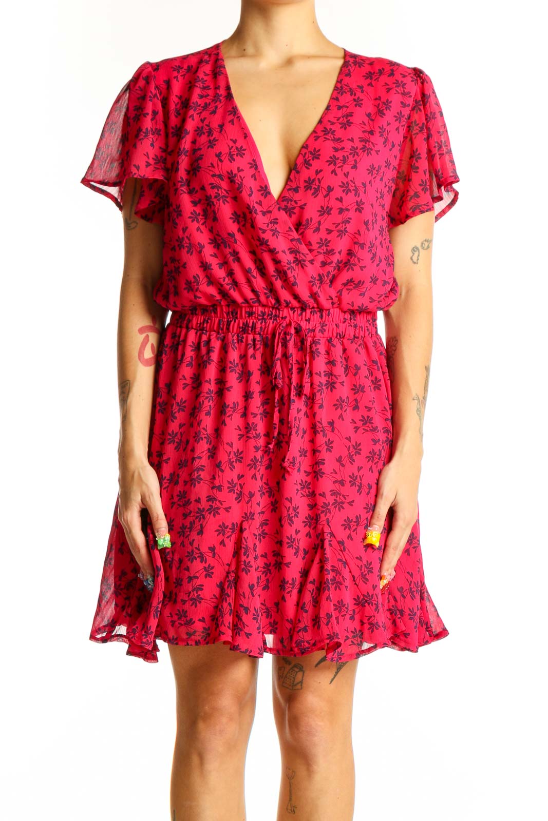 Front view of red floral wrap mini dress with v-neckline and short sleeves