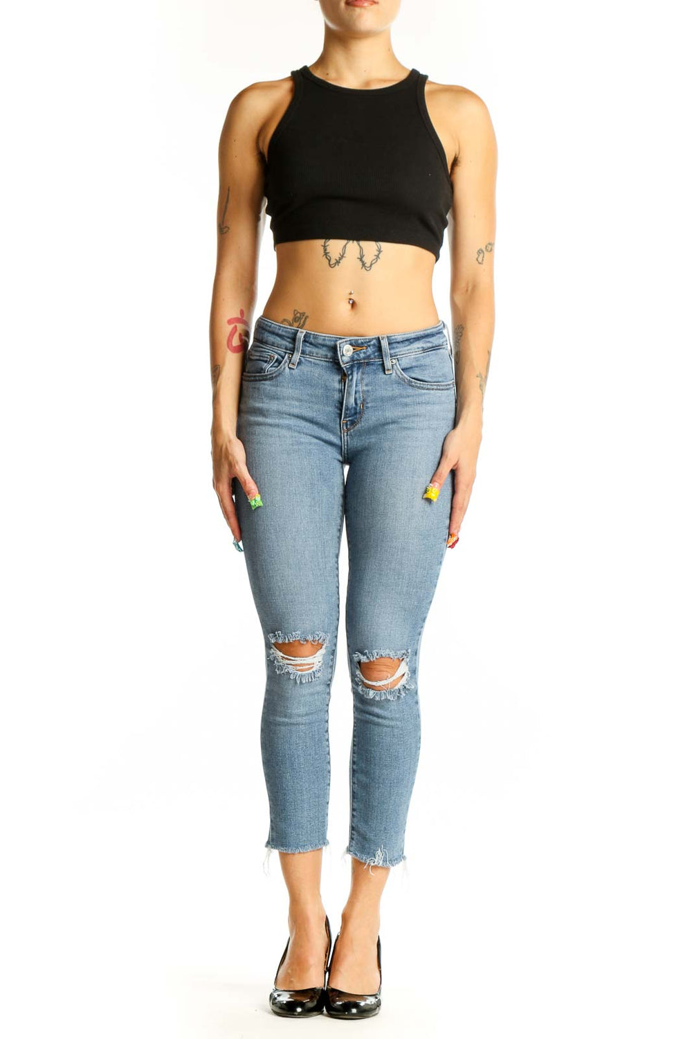 Front view of 711 Levis light blue distressed cropped skinny jeans
