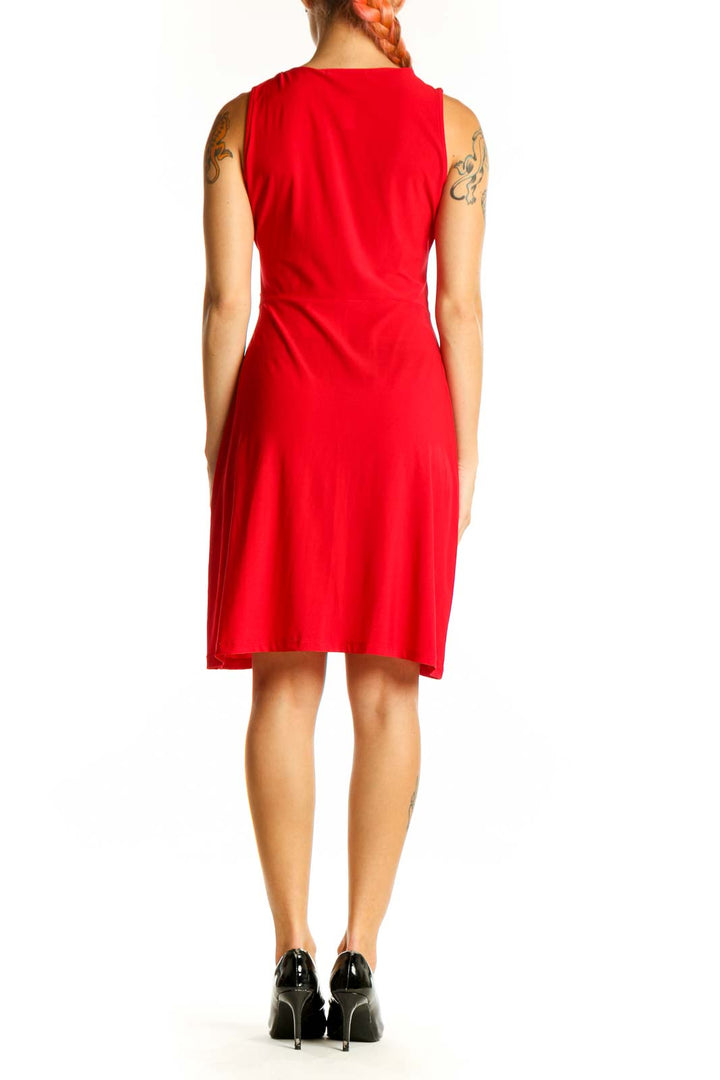 Side view of red wrap-style sleeveless dress by Hail3y:23