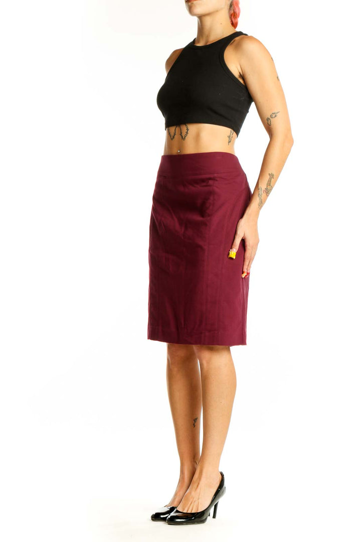 Front view of burgundy Express pencil skirt on model