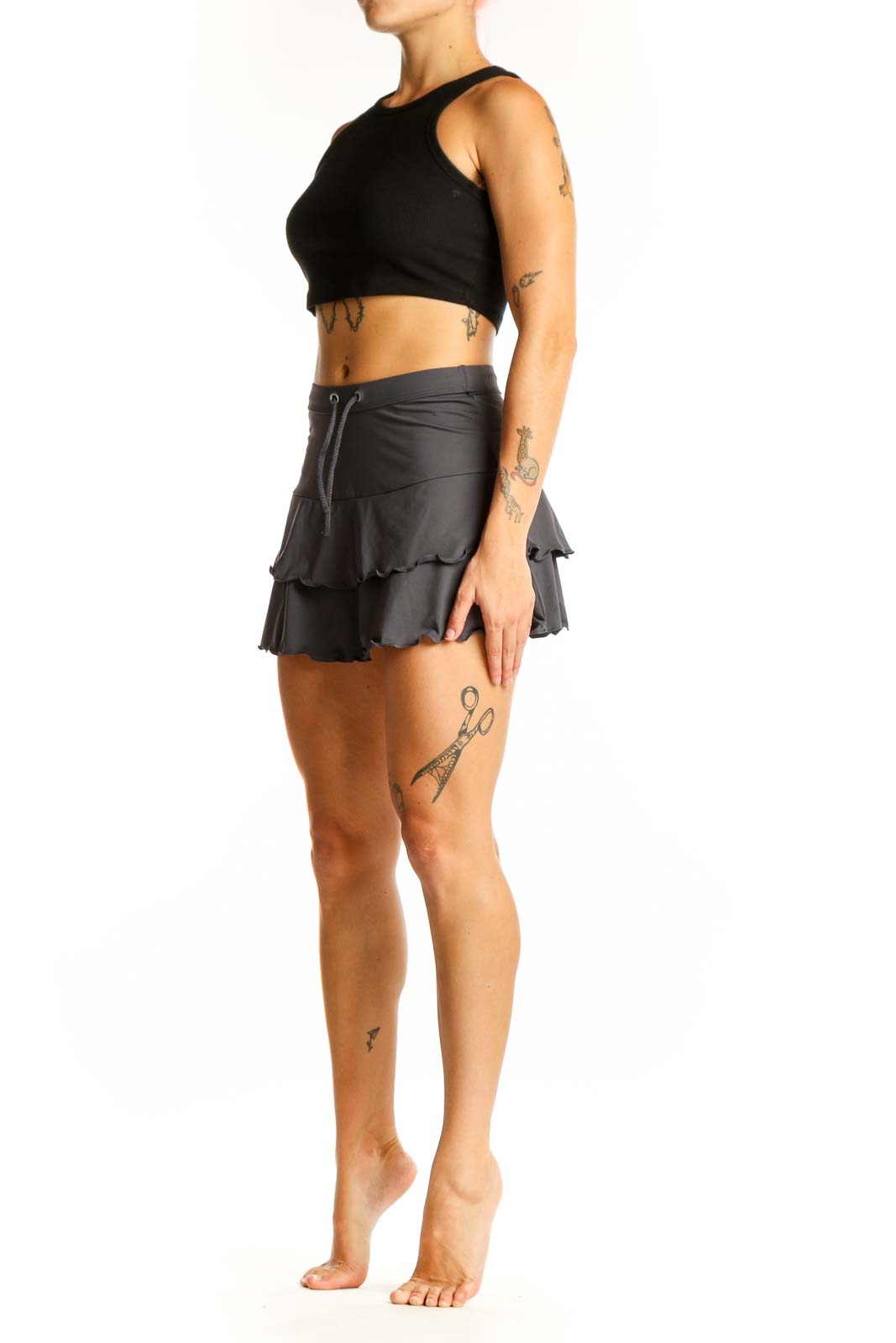 Front view of gray ruffled athletic skirt from Athleta