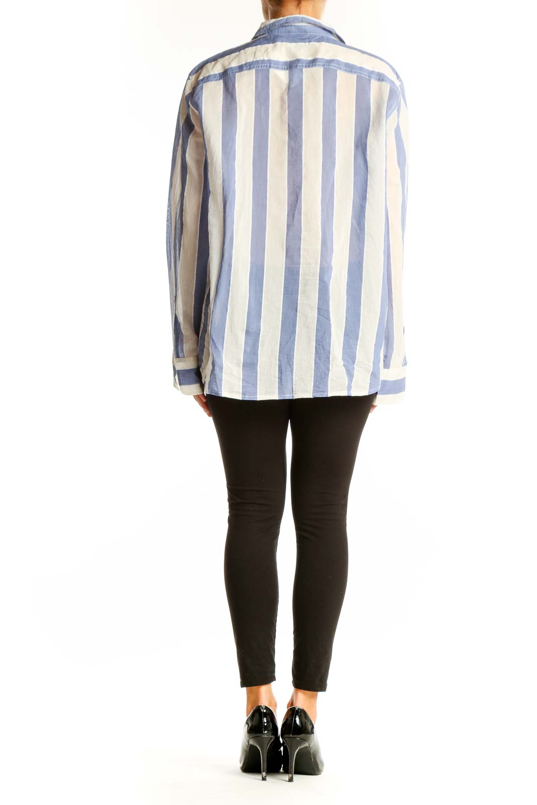 Side view of model wearing J.Crew blue and white striped cotton-silk blend shirt