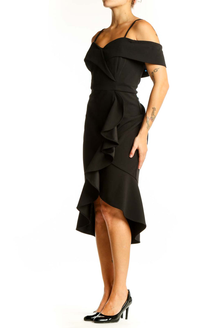 Front view of black off-shoulder ruffle cocktail dress by Bebe