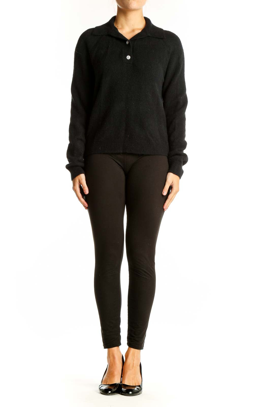 Front view of J.Crew black wool blend polo sweater on model