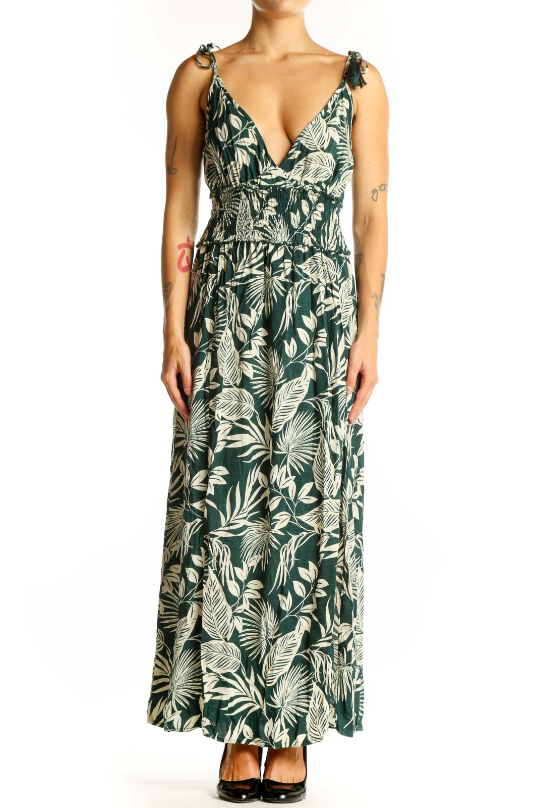 Front view of green tropical print maxi dress with V-neckline and tie straps
