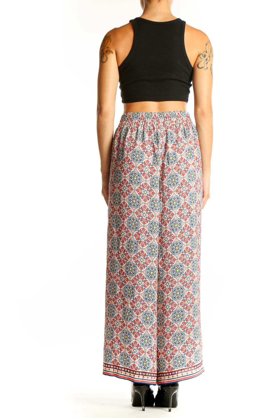 Side view of model wearing Max Studio Multicolor Geometric Print Wide-Leg Pants