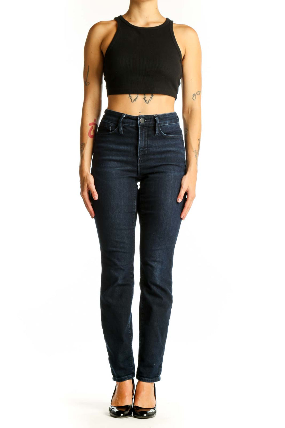 Front view of Athleta dark blue slim fit denim jeans on model