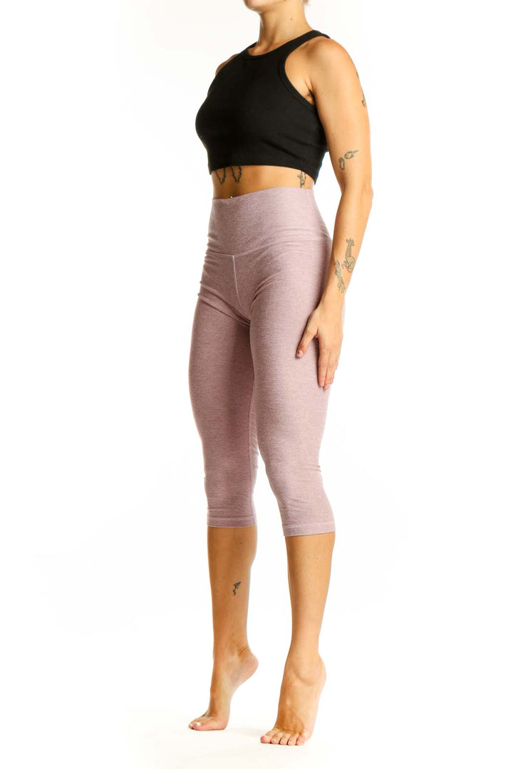 Front view of Scorpio Sol dusty rose high-waisted capri leggings