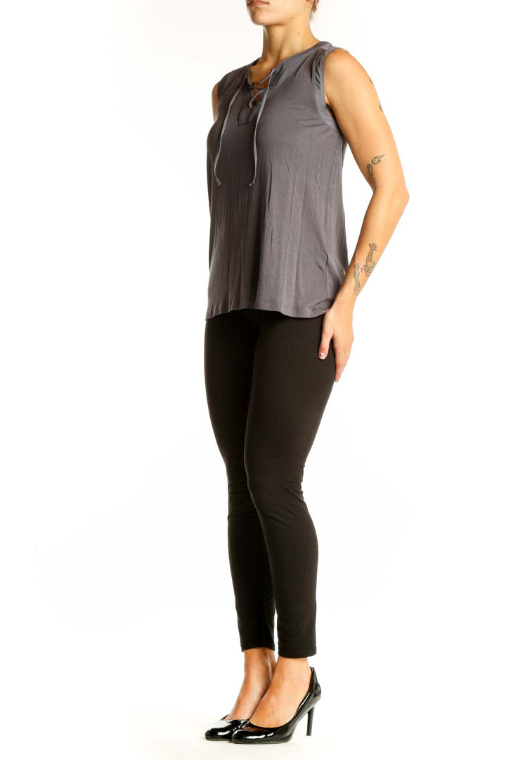 Front view of gray sleeveless top with lace-up neckline from Banana Republic