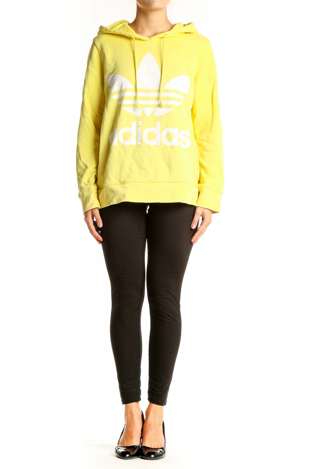 Front view of yellow Adidas hoodie with white Trefoil logo