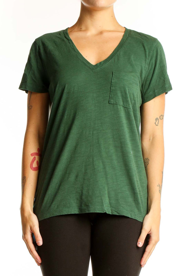 Front view of Madewell green V-neck cotton tee with chest pocket