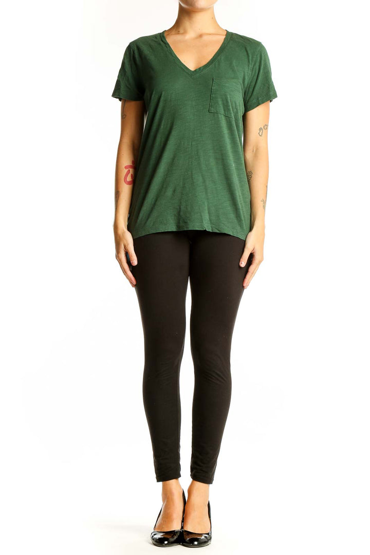 Front view of Madewell green V-neck cotton tee with chest pocket