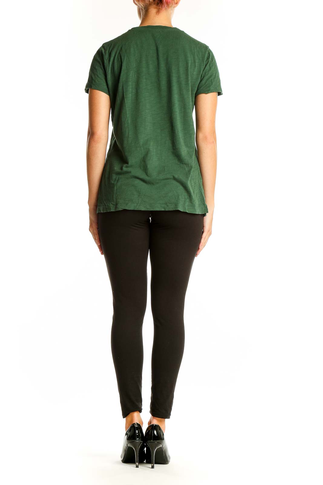 Side view of woman wearing Madewell green V-neck cotton tee