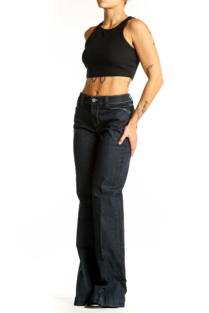 Front view of dark blue wide-leg denim jeans from White House Black Market