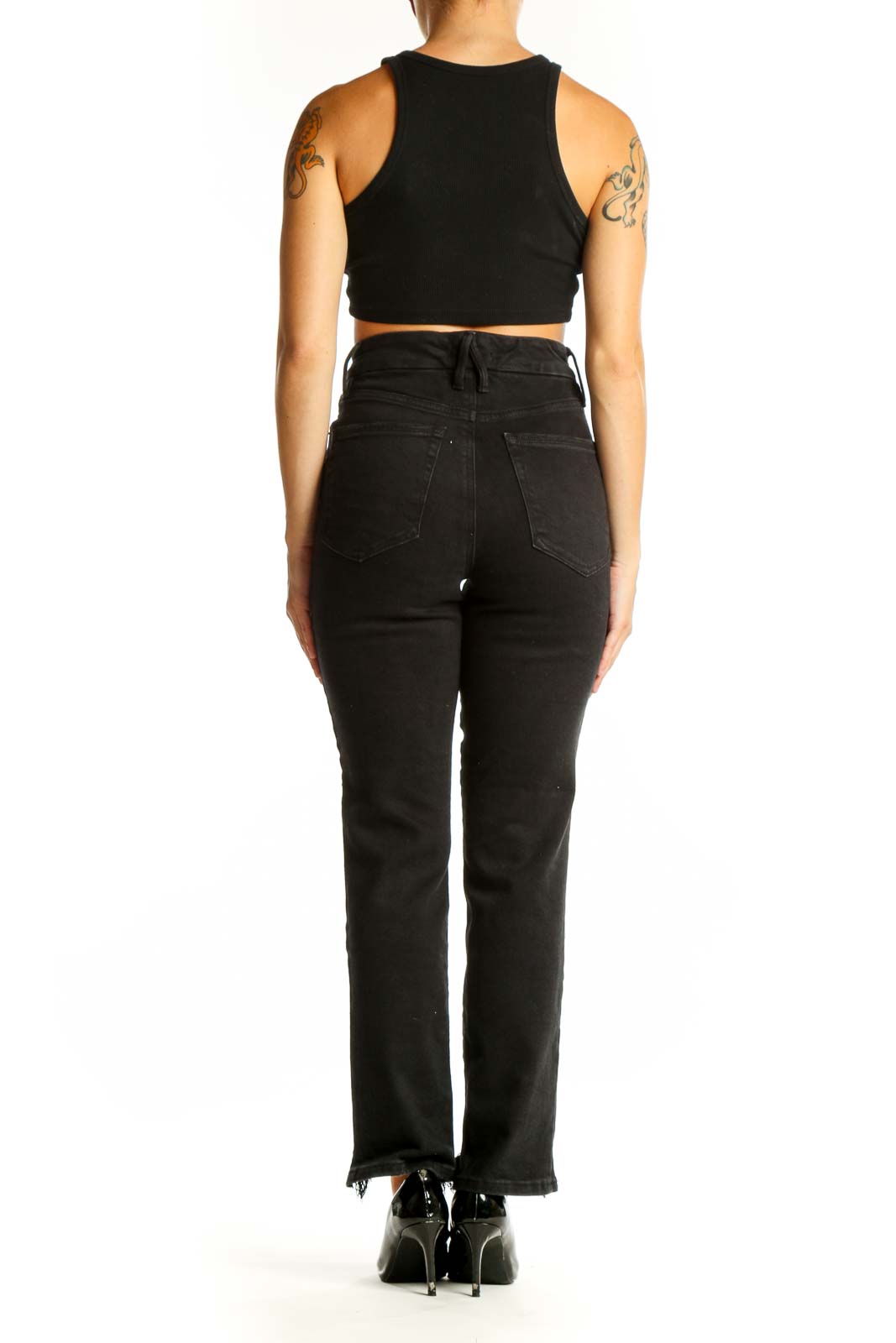 Back view of Good American black high-waisted straight-leg jeans on model