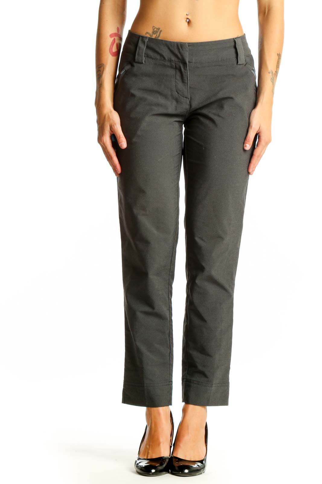 Front view of gray Adidas athletic pants on model