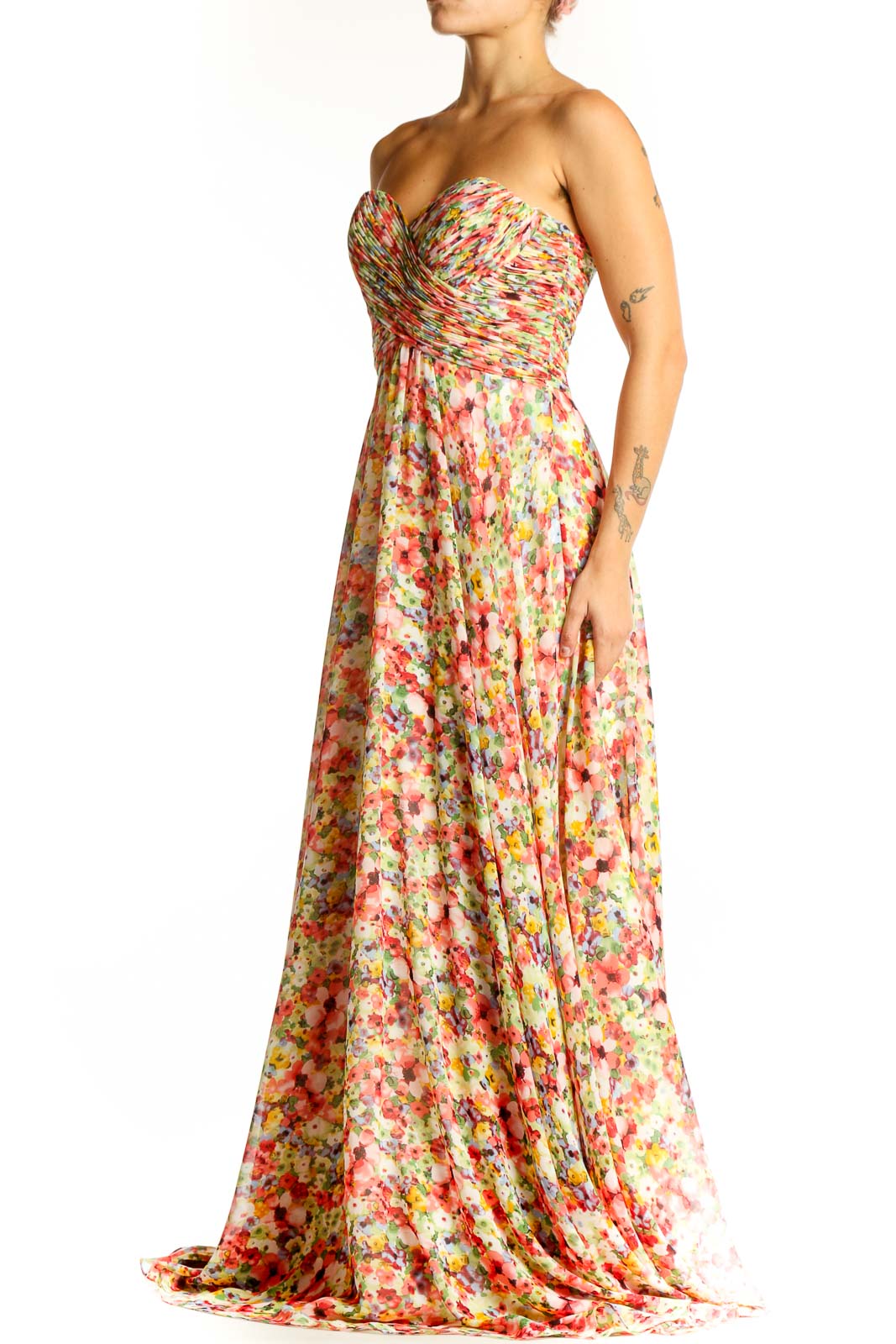Front view of multicolor floral strapless gown with sweetheart neckline