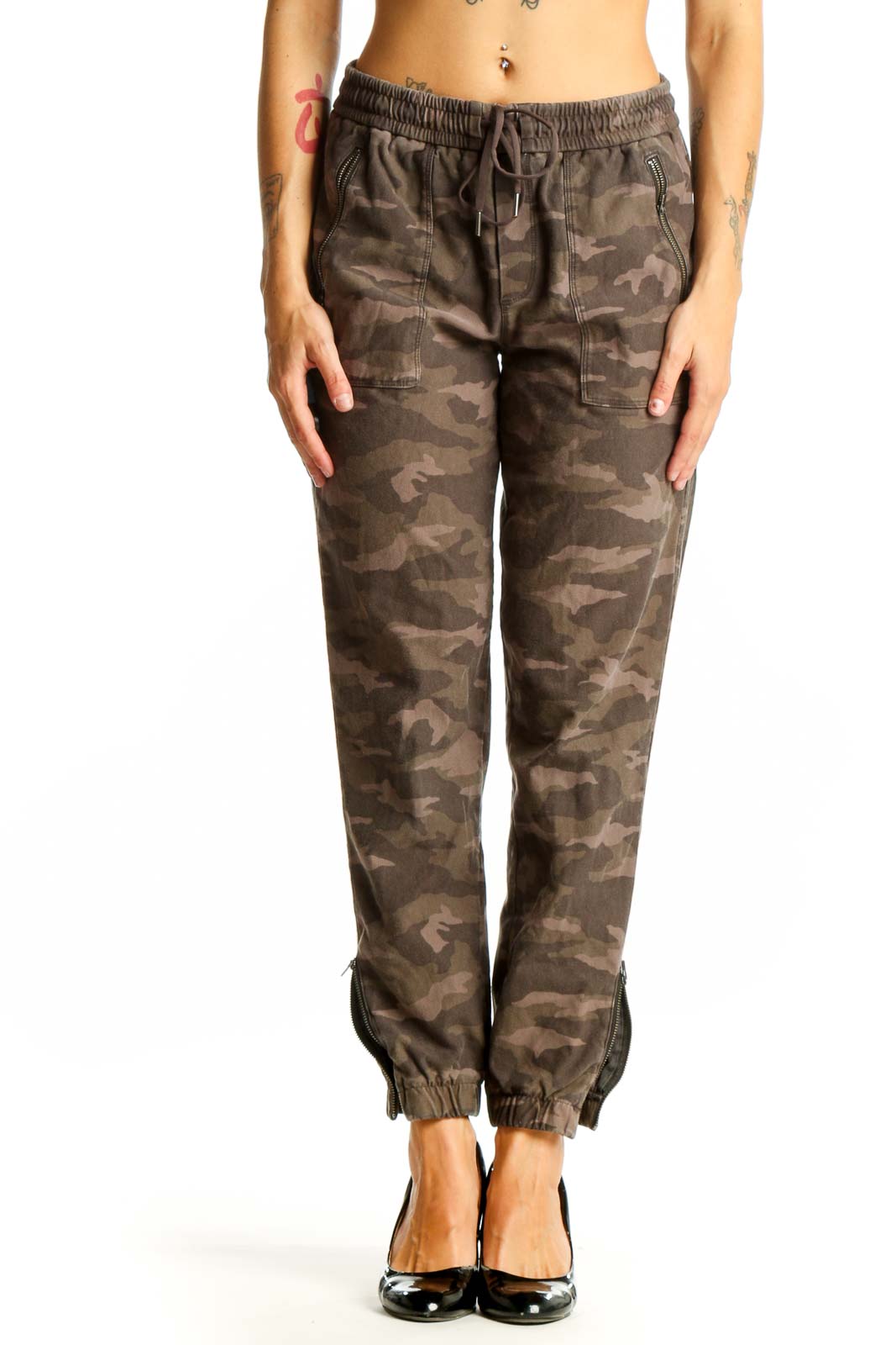 Front view of Athleta brown camo jogger pants with elastic waistband and side pockets