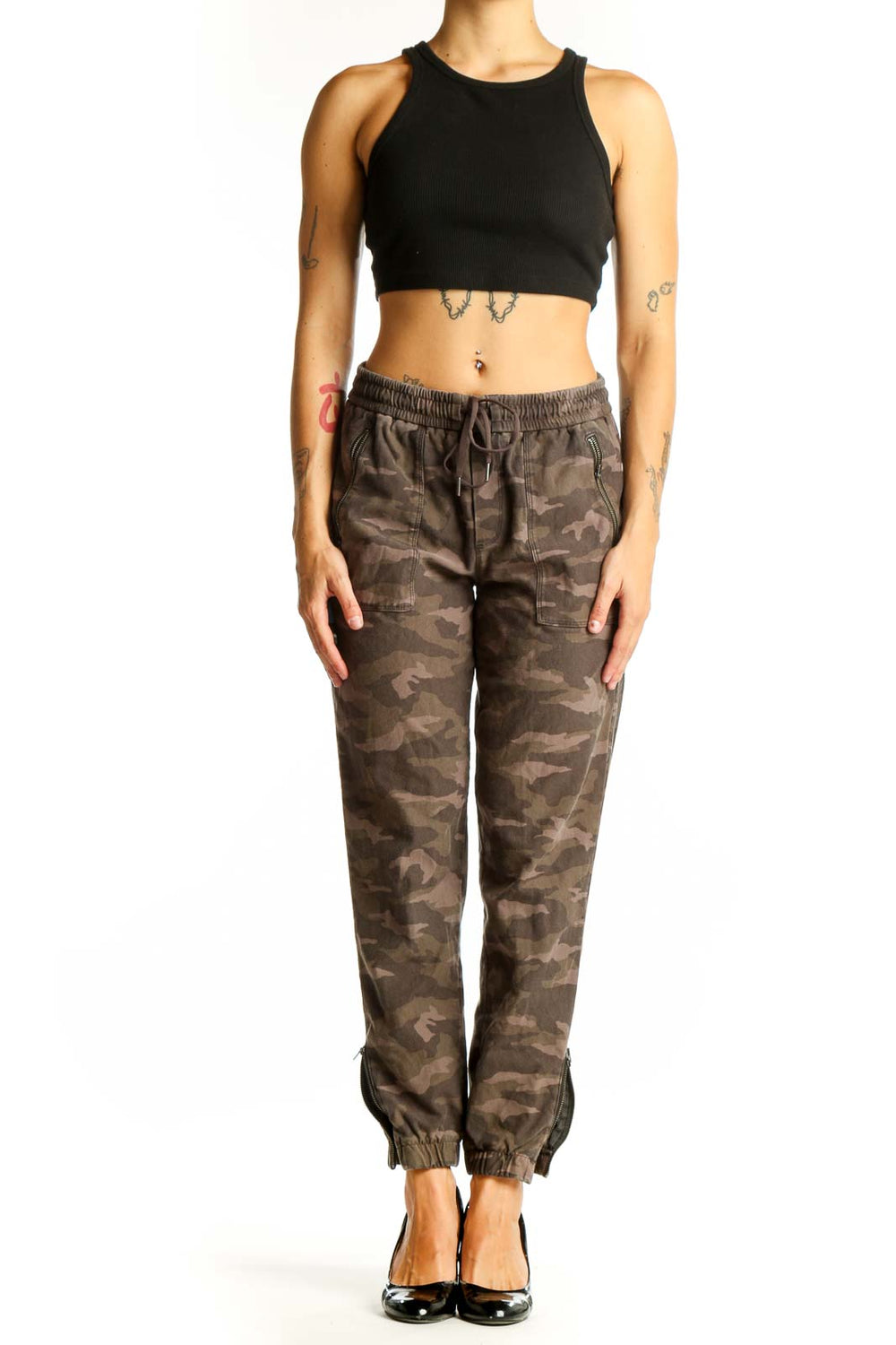 Front view of Athleta brown camo jogger pants with elastic waistband and side pockets