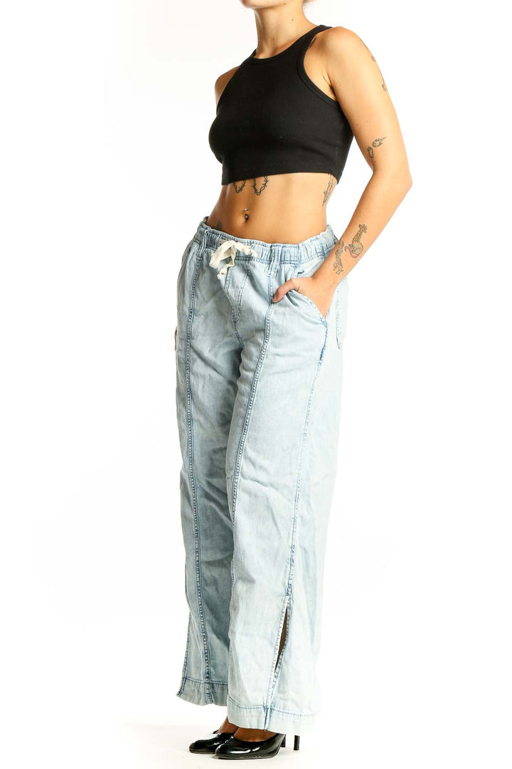 Front view of light blue wide-leg cotton pants from Gap