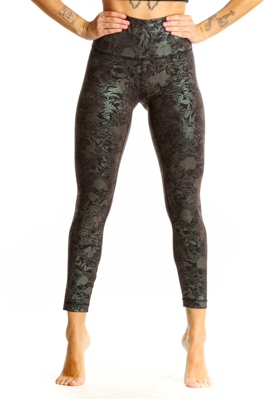 Front view of Lululemon dark green floral print high-waisted activewear leggings