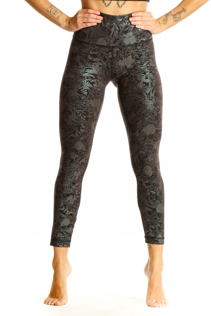 Front view of Lululemon dark green floral print high-waisted activewear leggings