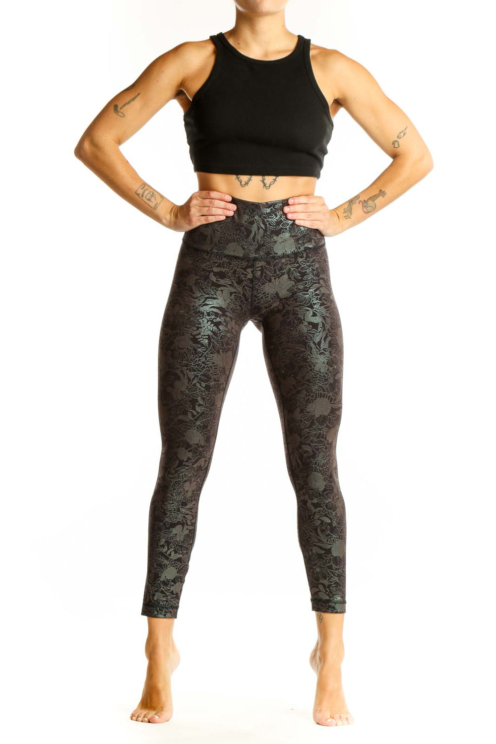 Front view of Lululemon dark green floral print high-waisted activewear leggings