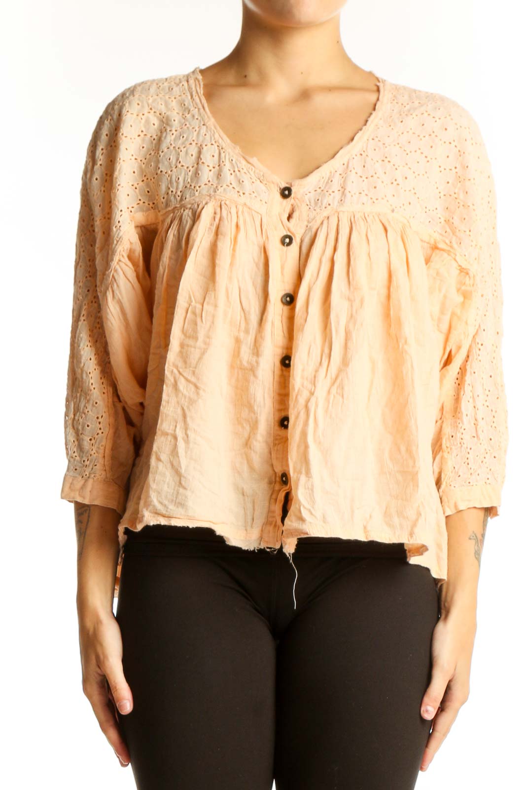 Front view of Free People peach eyelet lace button-up blouse