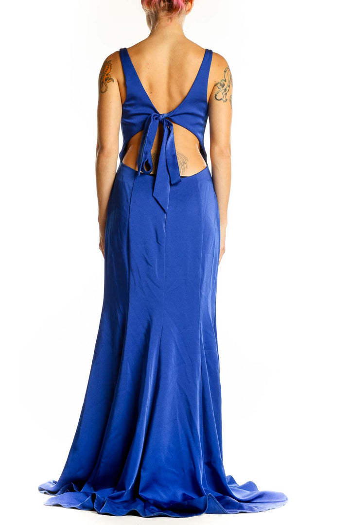 Back view of royal blue ALYCE paris mermaid gown showing low back design