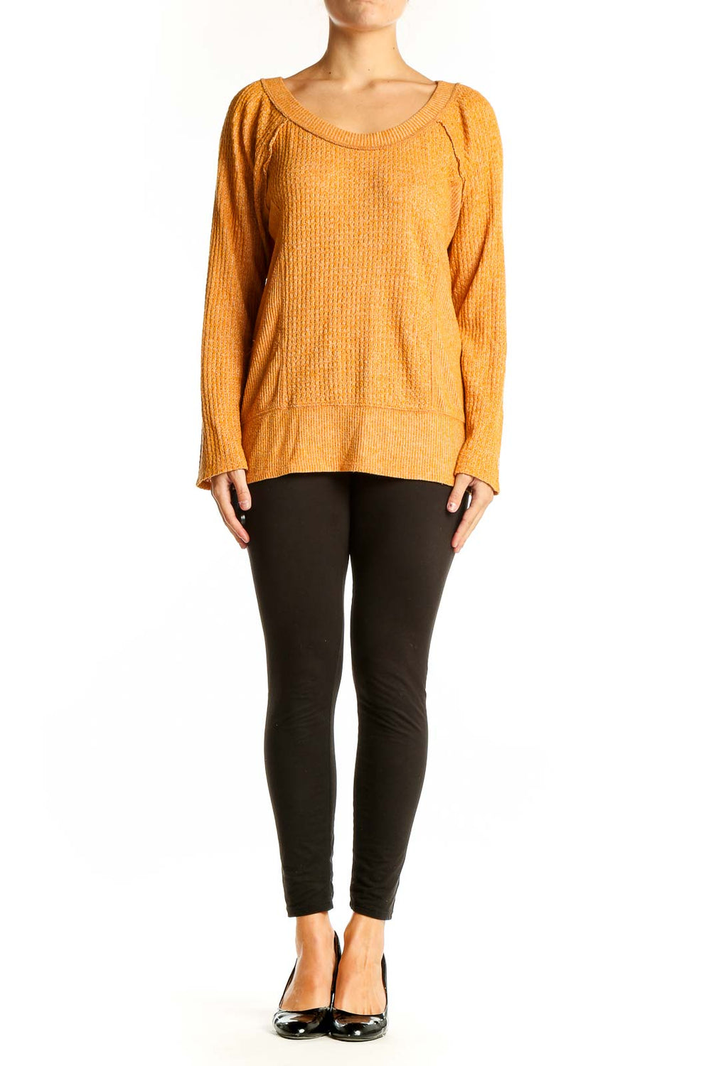 Front view of orange textured knit sweater by Eri + Ali