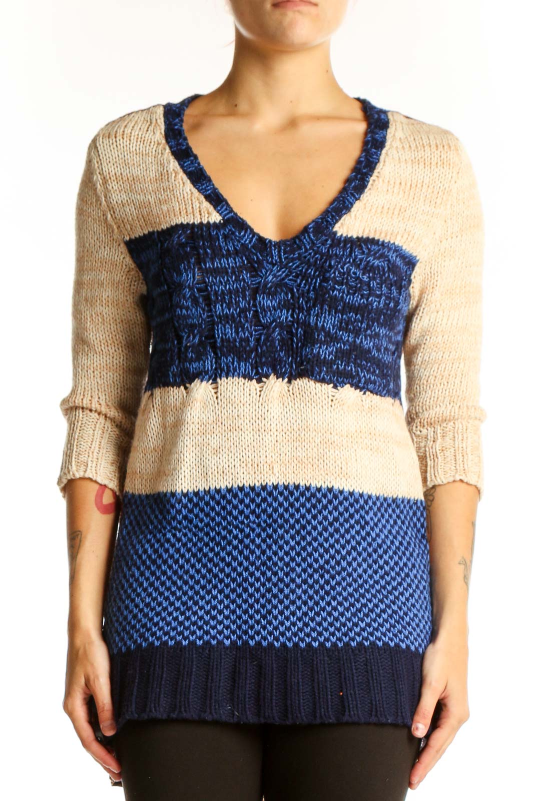 Front view of Nick & Mo blue and beige striped V-neck knit sweater with color-block design