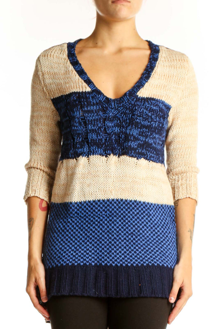Front view of Nick & Mo blue and beige striped V-neck knit sweater with color-block design