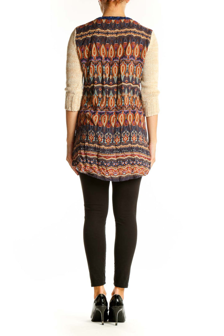 Side view of Nick & Mo blue and beige striped V-neck knit sweater showing 3/4 length sleeves